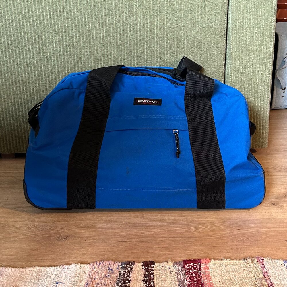 Eastpak Container 65 Duffel Wheel Bag in Full Tank Blue (72 L)